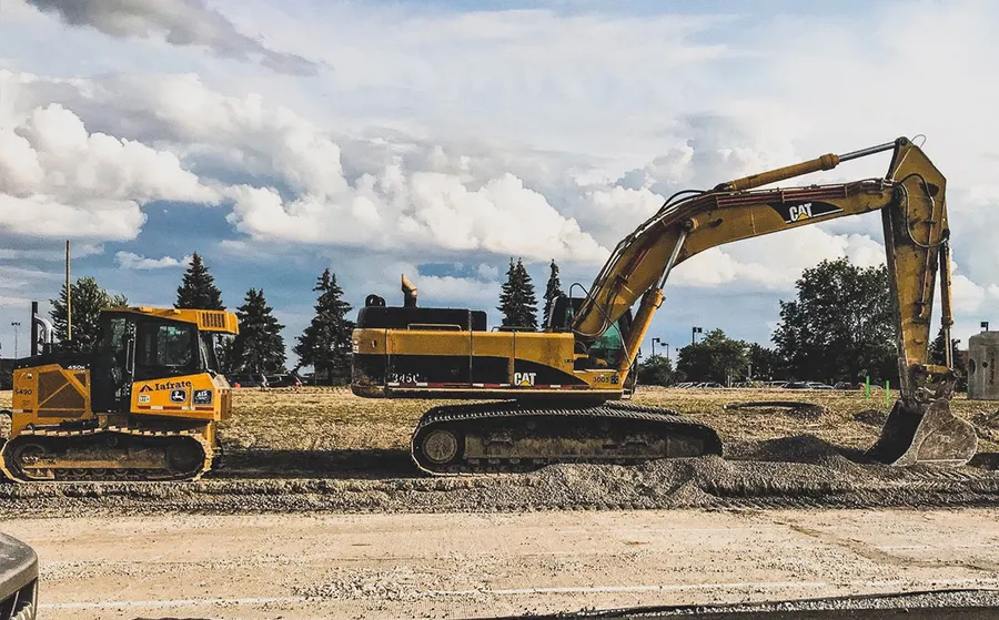 Excavators preparing a building site